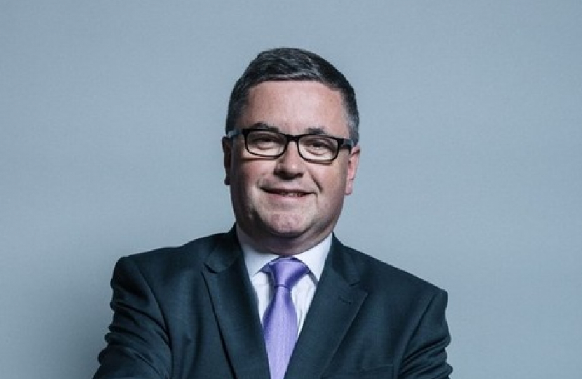 head and shoulders pic of Sir Robert Buckland